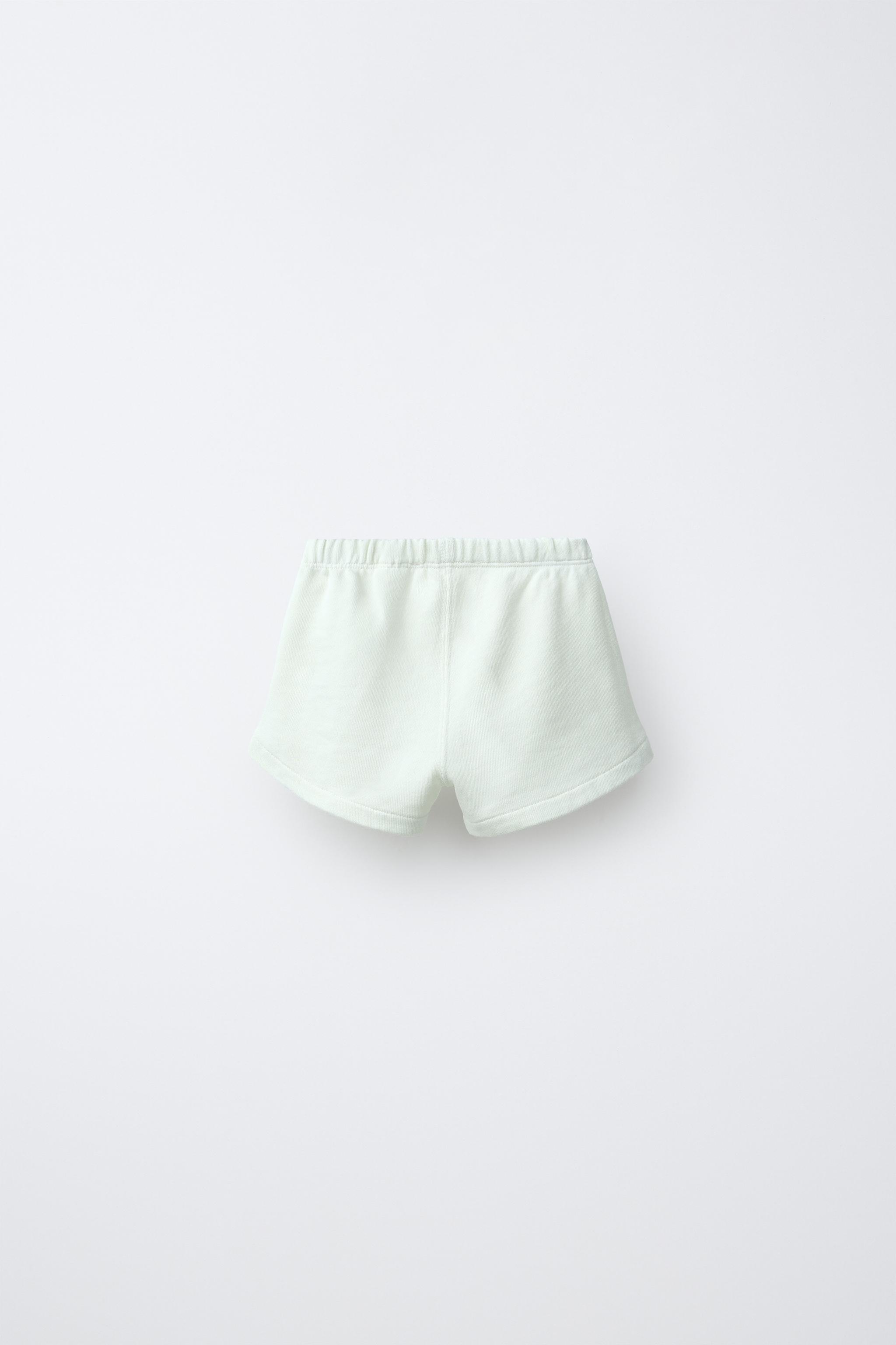 SHORT POUSSIN BRODÉ EN VELOURS BOUCLÉ